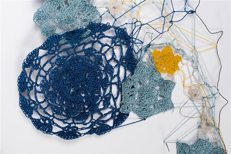 Crocheted panels translate IOM data on migrant flows in Türkiye into texture and color, with each piece representing a different data range from 2023. Photo: Parsons MFA Textiles 2025/Jason Philip Greenberg