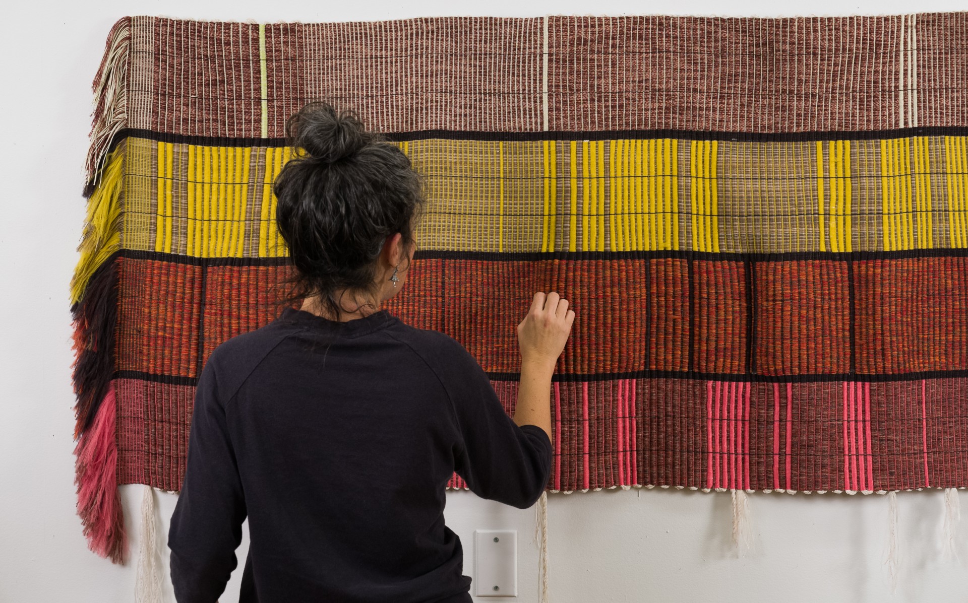 Rachel Dana created a textile piece interpreting climate-driven displacement in Thi-Qar and Missan governorates, Iraq. Photo: Parsons MFA Textiles 2025/Jason Philip Greenberg